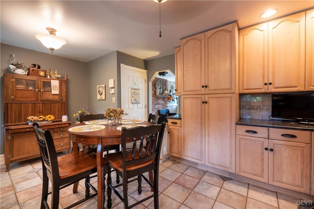 130 County Line Road Riegelsville, PA 18077 - Photo 18 of 40 a view of a dining room with furniture and chandelier