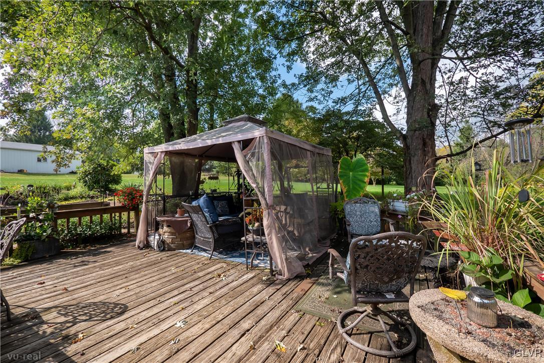 130 County Line Road Riegelsville, PA 18077 - Photo 32 of 40 a view of a chairs and table in a patio
