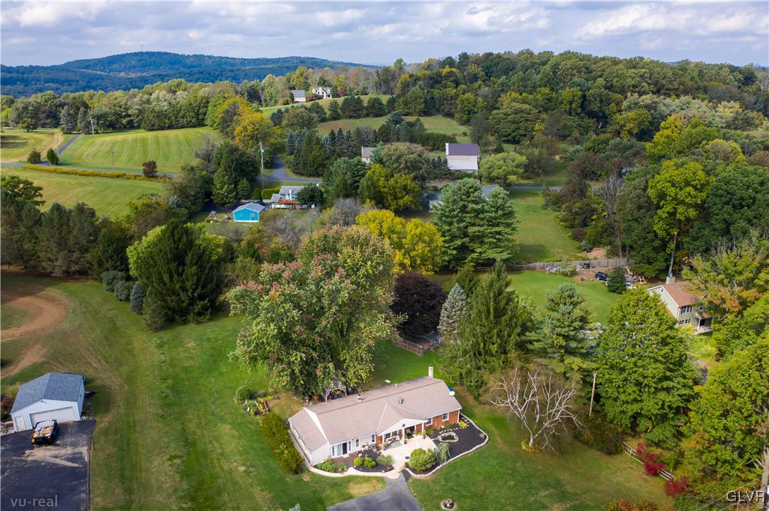 130 County Line Road Riegelsville, PA 18077 - Photo 8 of 40 an aerial view of a house with a yard