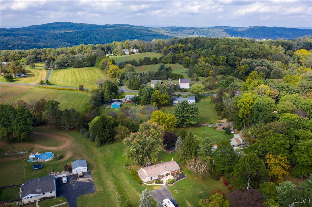 130 County Line Road Riegelsville, PA 18077 - Photo 9 of 40 a view of a lake with a city