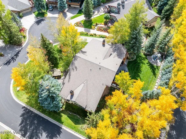a kitchen with stainless steel appliances a sink stove and refrigerator
