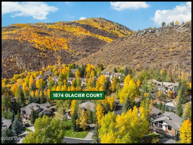 a view of a house with a street