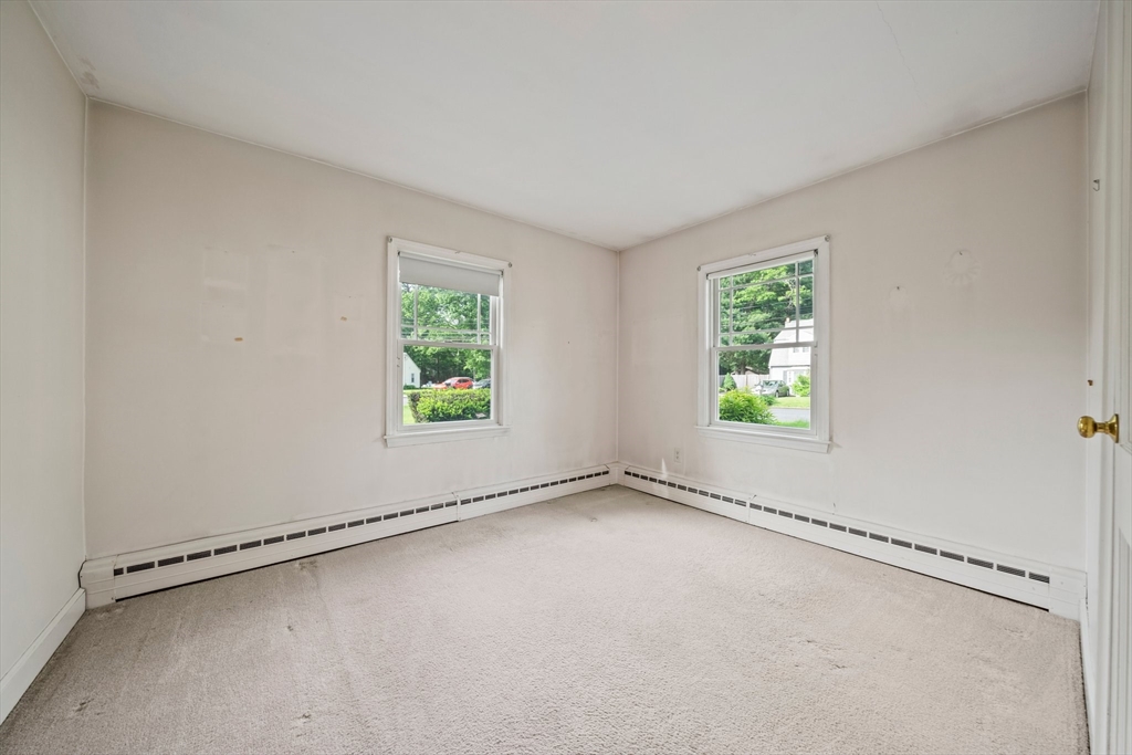 34 Birchcroft Road Canton, MA 02021 - Photo 16 of 31 a view of an empty room with a window and a window