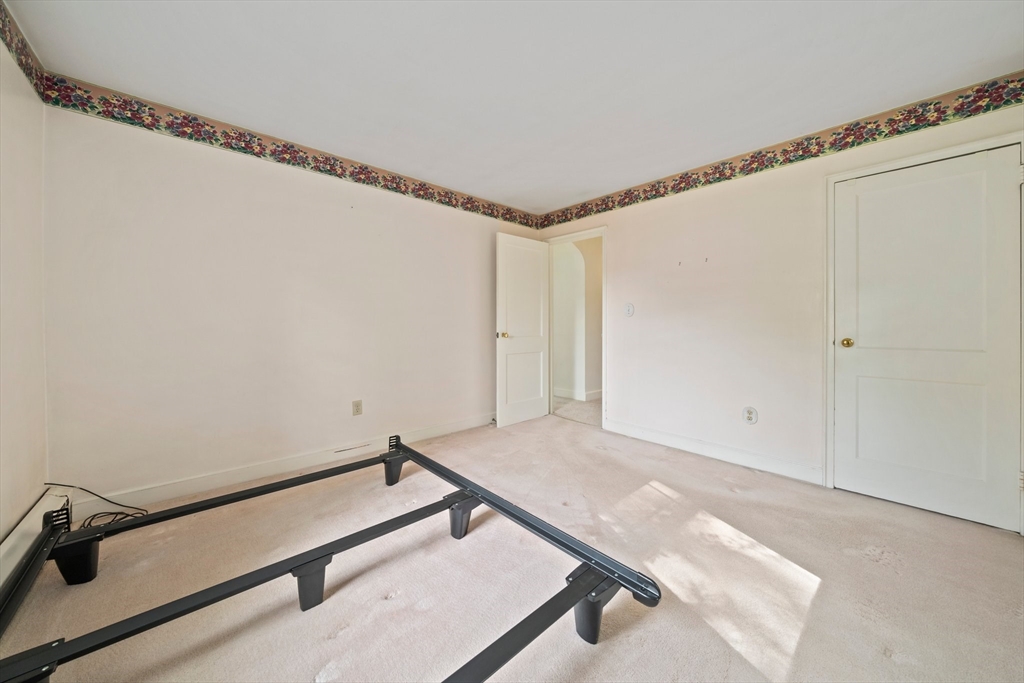 34 Birchcroft Road Canton, MA 02021 - Photo 21 of 31 a view of a room with rack on the wall