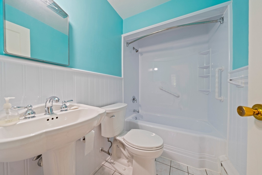 34 Birchcroft Road Canton, MA 02021 - Photo 22 of 31 a bathroom with a sink toilet and shower