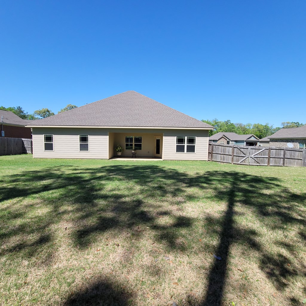 19 Fast Lane Seale, AL 36875 - Photo 17 of 18 a house view with a garden space