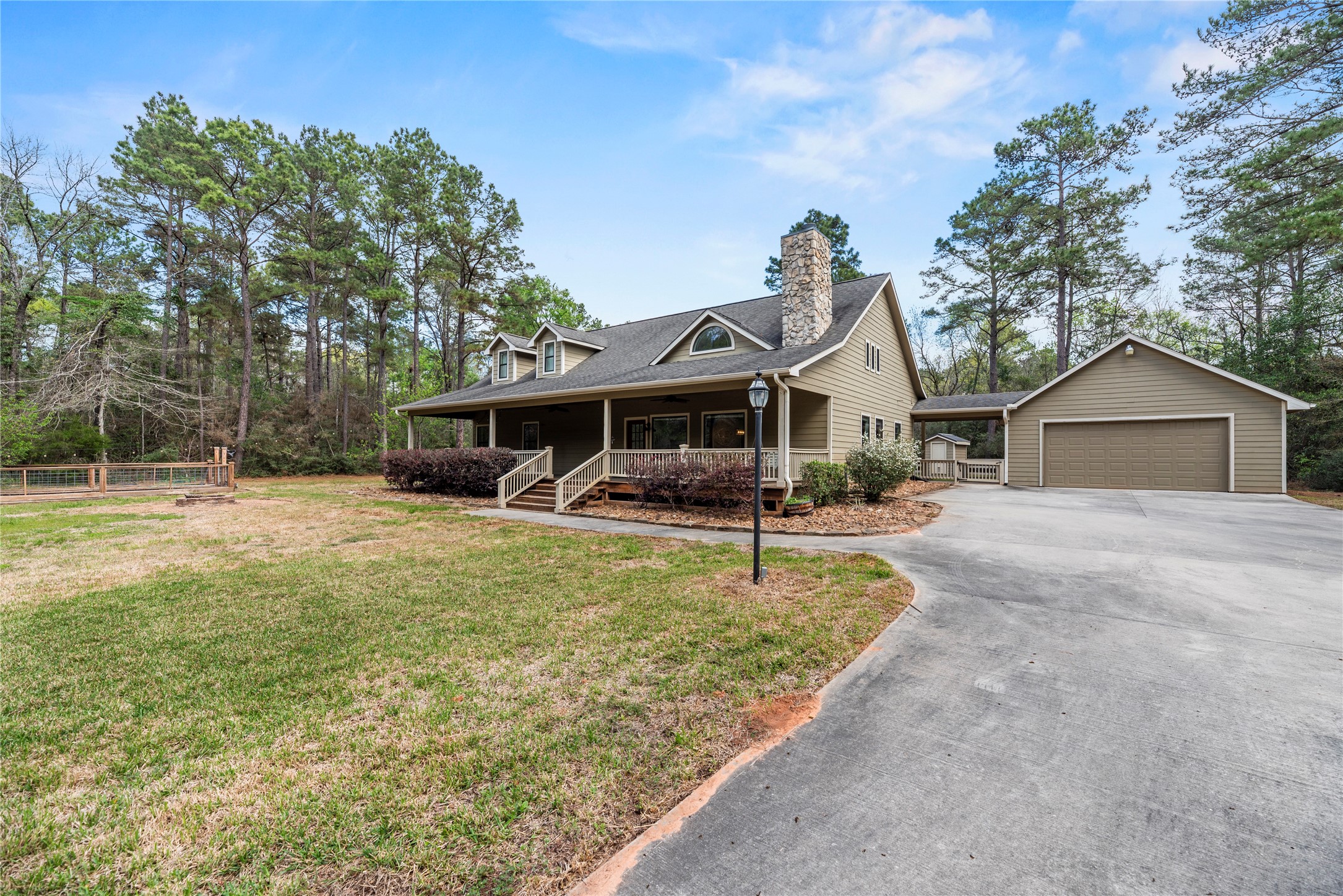 12062 Ike White Road Conroe, TX 77303 - Photo 8 of 37 2-car detached garage with plenty of parking.
