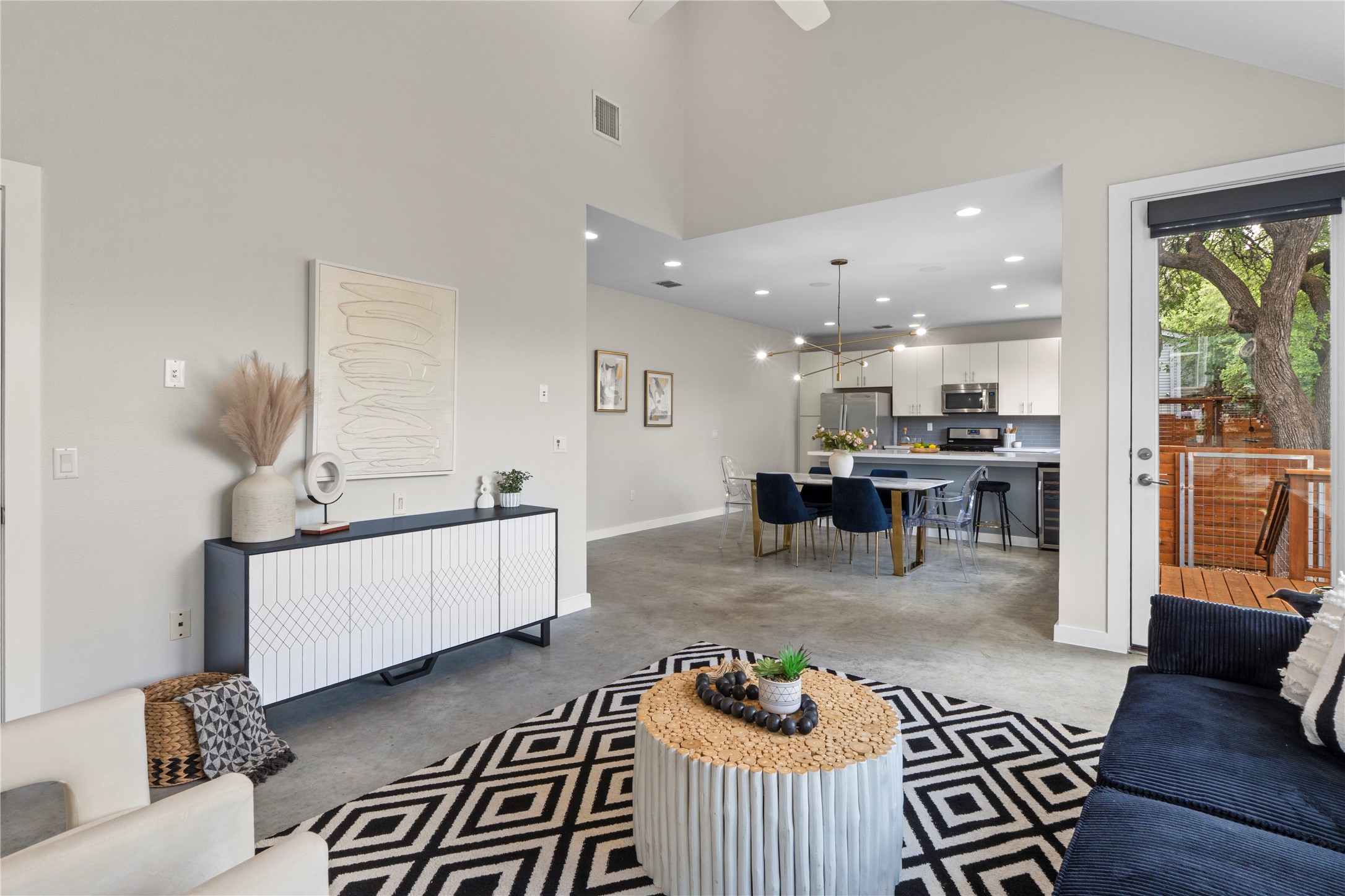 3001 Del Curto Road, Unit 35 Austin, TX 78704 - Photo 4 of 22 This spacious interior features high vaulted ceilings, modern recessed lighting, and durable concrete flooring