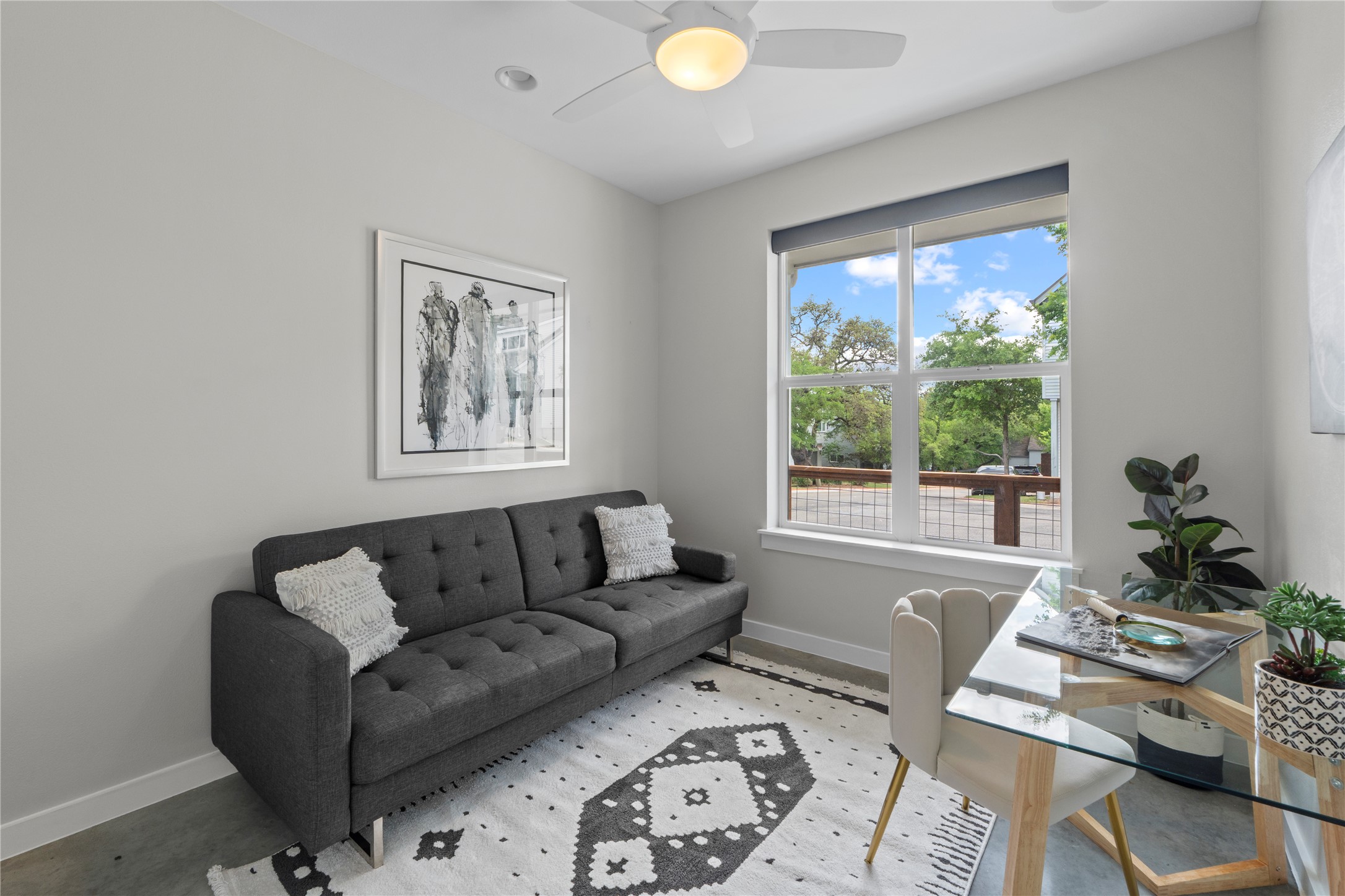 3001 Del Curto Road, Unit 35 Austin, TX 78704 - Photo 9 of 22 This versatile room features light gray walls, recessed lighting, and a ceiling fan with an integrated light