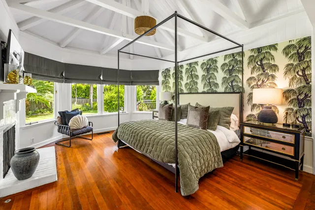 a room with a mirror and a sink