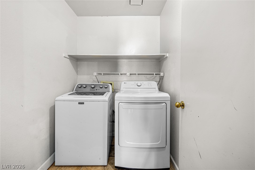 1624 Palmae Way Las Vegas, NV 89128 - Photo 14 of 18 This dedicated laundry nook provides ample space for household tasks.