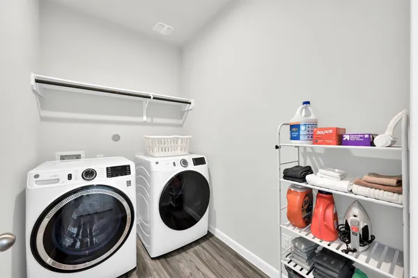 a utility room with dryer and washer