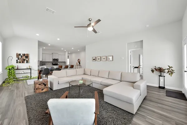 a living room with furniture and a couch