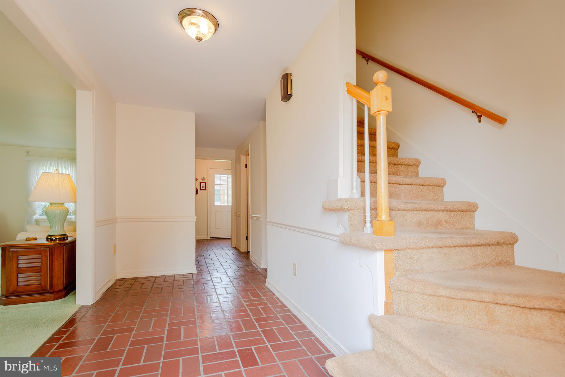 1120 Haymaker Road State College, PA 16801 - Photo 20 of 53 Entry and stairs, laundry room at the other end