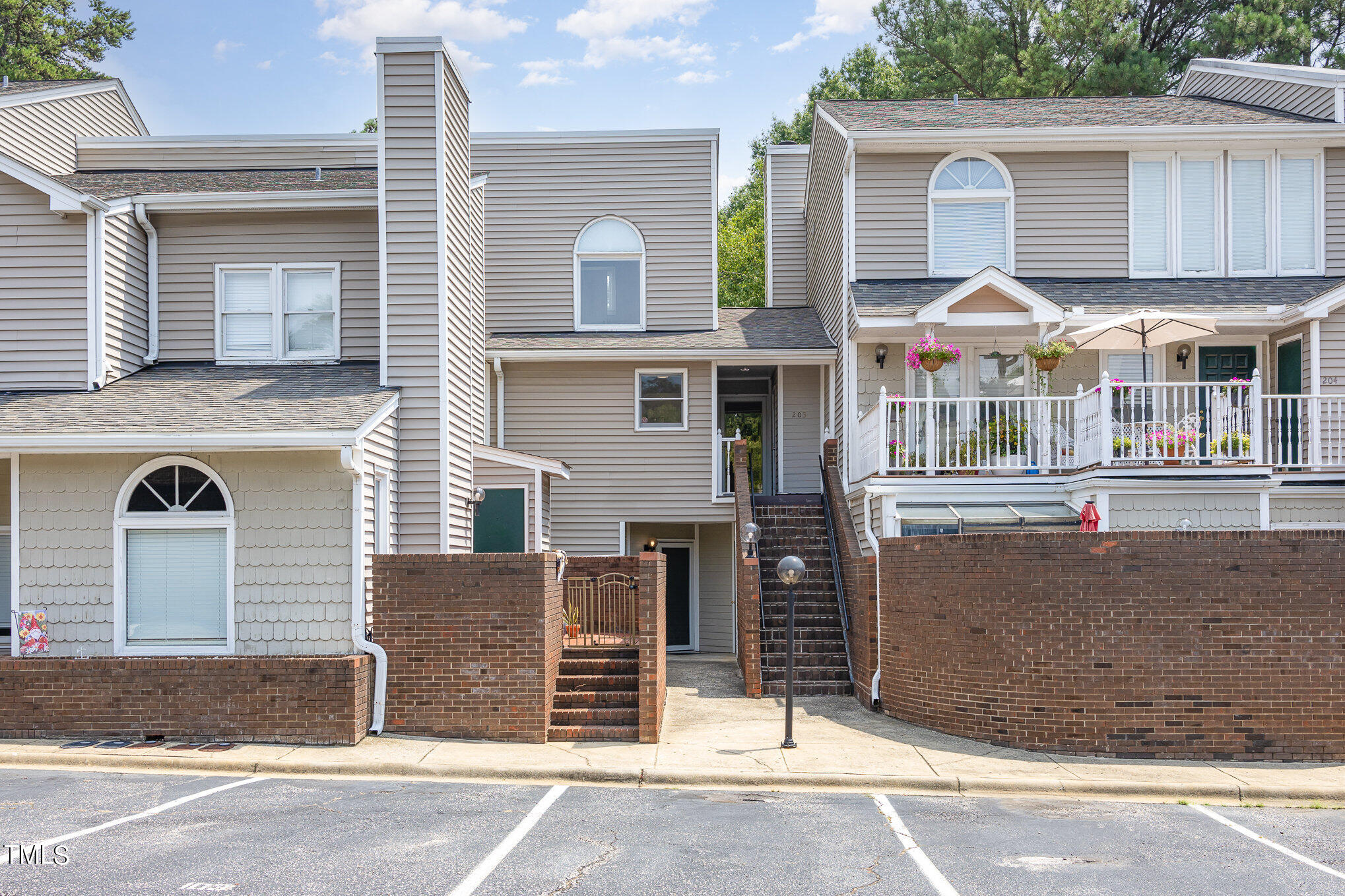 7040 Sandy Forks Road, Unit 203 Raleigh, NC 27615 - Photo 1 of 30 front view of a house