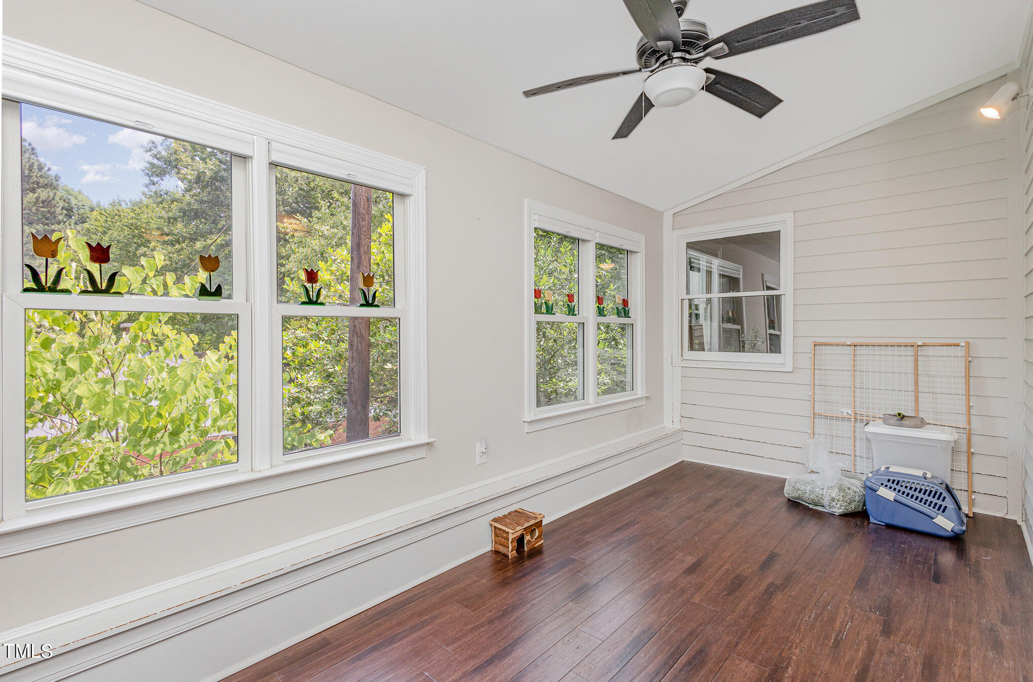 7040 Sandy Forks Road, Unit 203 Raleigh, NC 27615 - Photo 6 of 30 a living room with furniture and a window