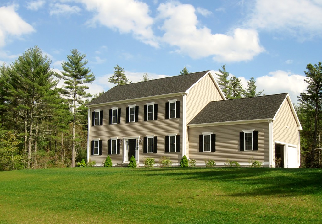 Lot 41-153 Forbes Road Rochester, MA 02770 - Photo 1 of 5 a front view of a house with a garden