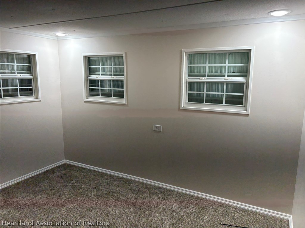 7938 Elliott Road Sebring, FL 33876 - Photo 11 of 20 an empty room with a window