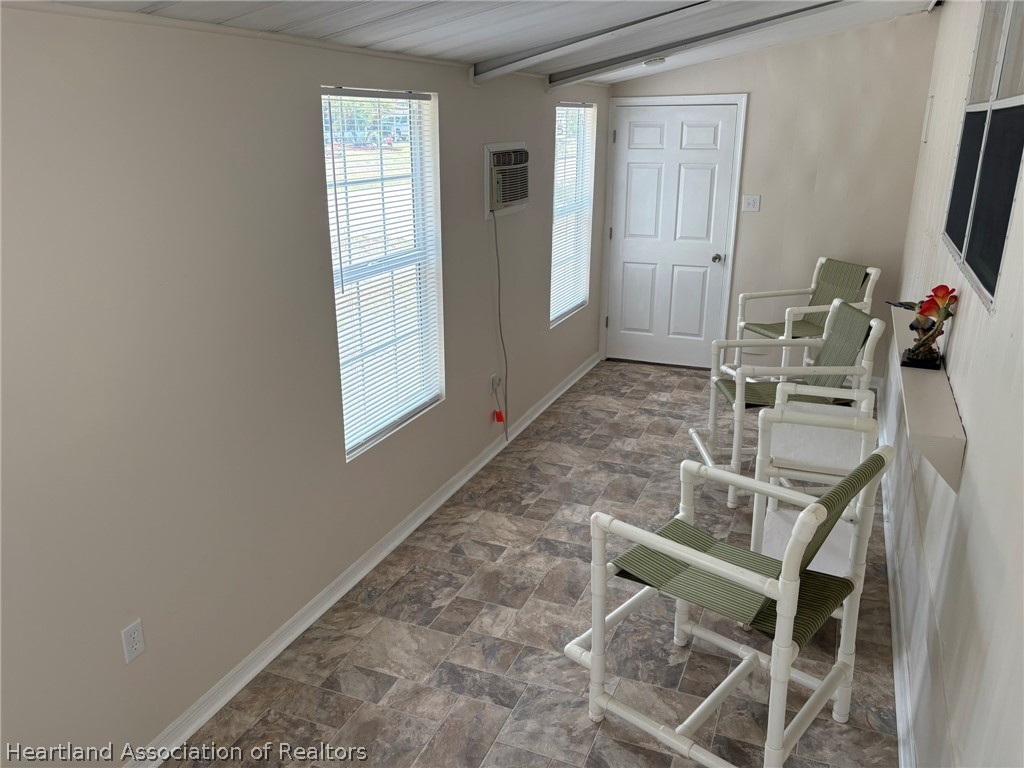 7938 Elliott Road Sebring, FL 33876 - Photo 16 of 20 a view of a room with table and chair