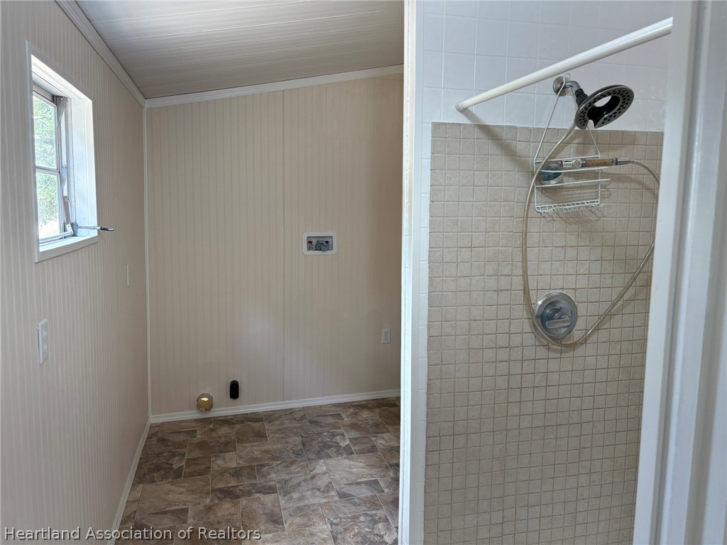 7938 Elliott Road Sebring, FL 33876 - Photo 17 of 20 a bathroom with a shower