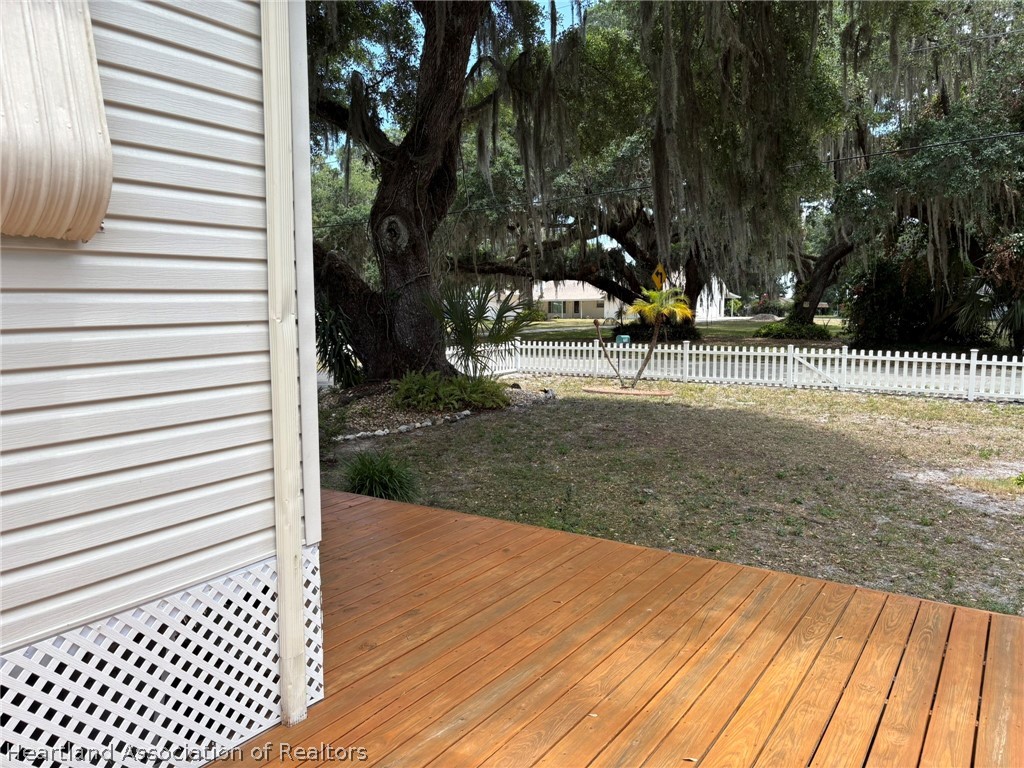 7938 Elliott Road Sebring, FL 33876 - Photo 18 of 20 a view of a yard with plants and trees