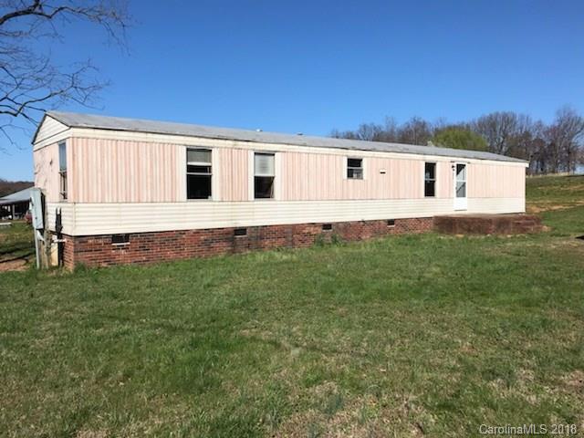 130 Branton Farm Road, Unit 6 Stony Point, NC 28678 - Photo 1 of 7 a house view with a garden space