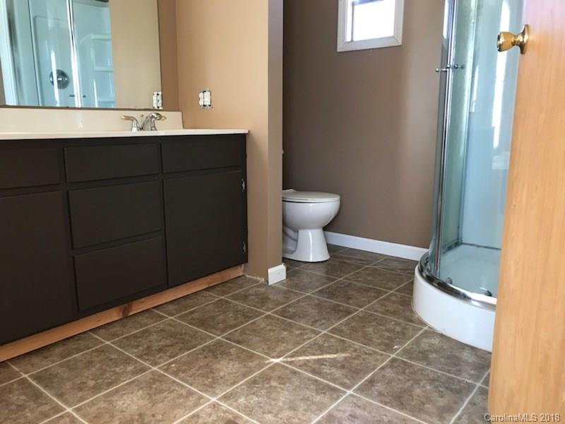 130 Branton Farm Road, Unit 6 Stony Point, NC 28678 - Photo 7 of 7 a bathroom with a sink and a toilet