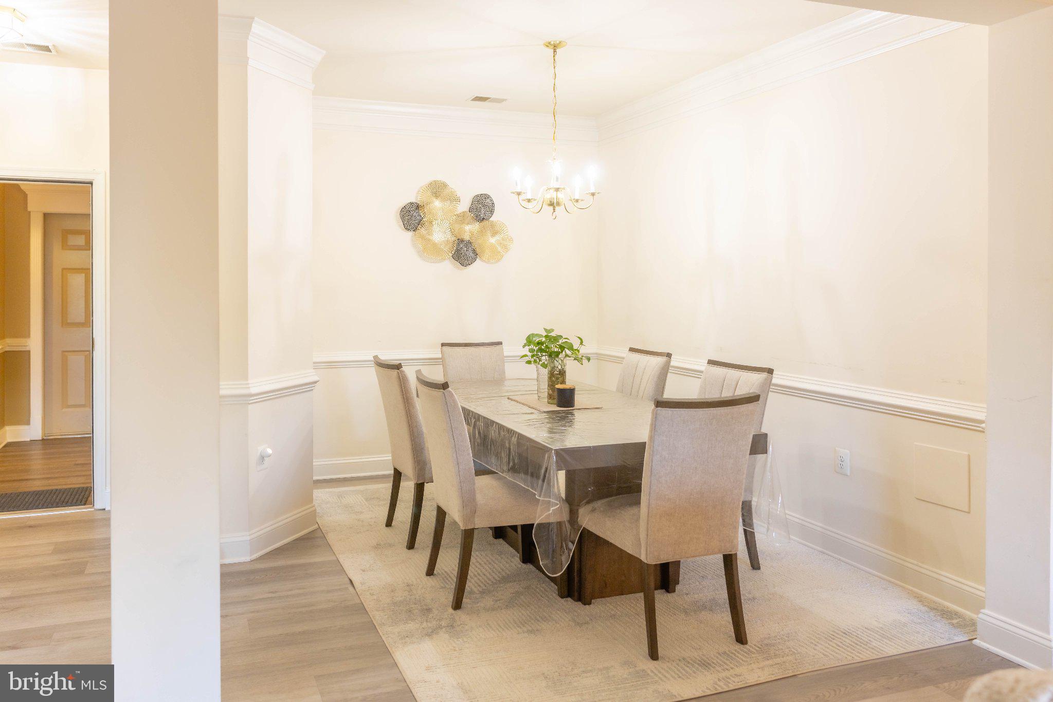12824 Clarksburg Square Road, Unit 105 Clarksburg, MD 20871 - Photo 49 of 96 Elegant dining space with modern charm.