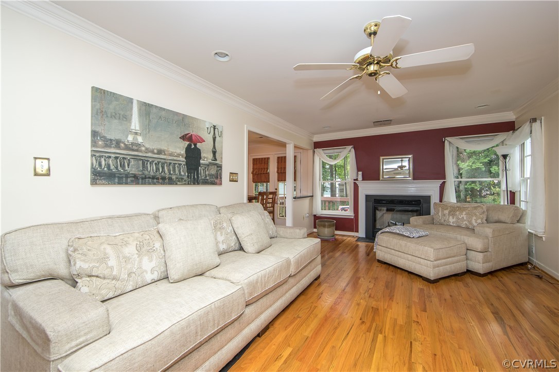15213 Windy Ridge Road Midlothian, VA 23112 - Photo 13 of 30 a living room with furniture and a fireplace