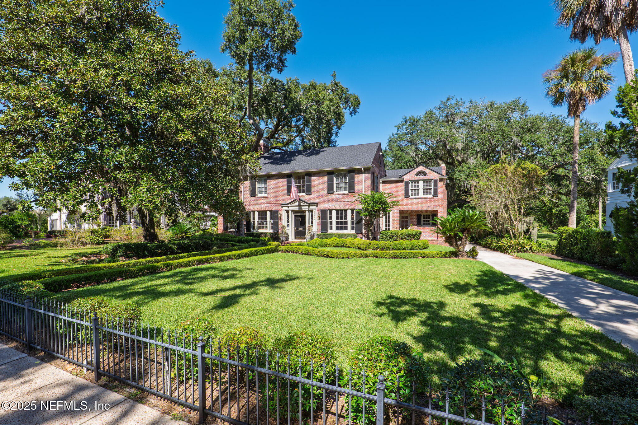 2127 River Road Jacksonville, FL 32207 - Photo 3 of 54 a view of a house with a big yard and large trees