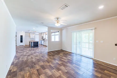 a view of a kitchen with a stove cabinets and wooden floor