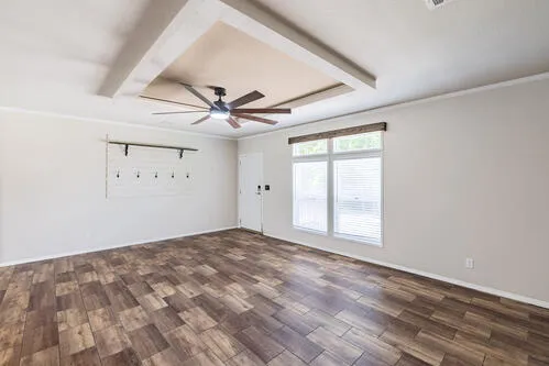 a view of empty room with a fireplace