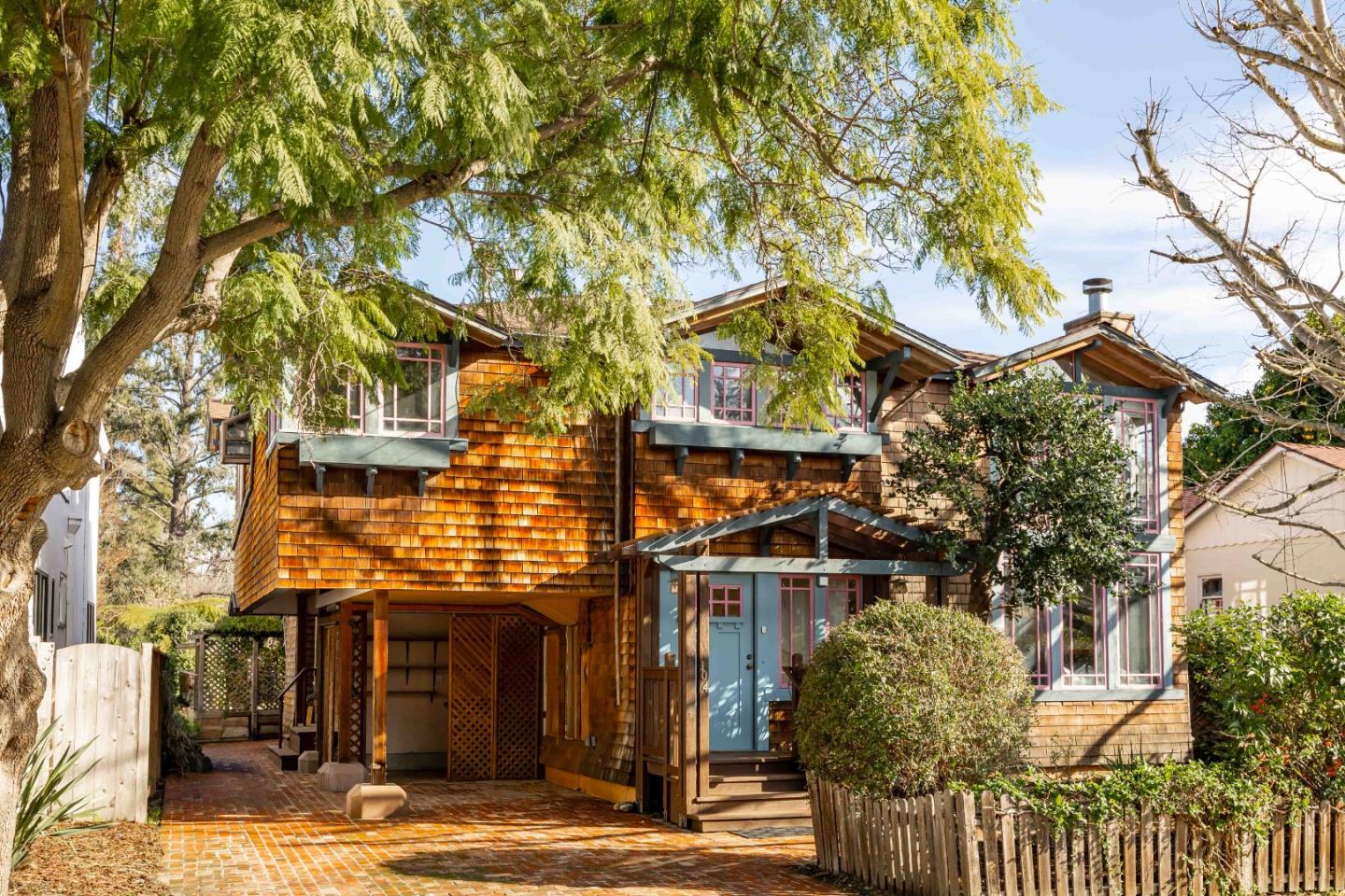 104 Clover Lane Menlo Park, CA 94025 - Photo 1 of 26 front view of a building with a tree