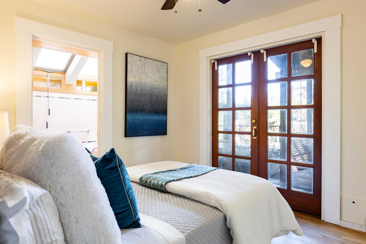 104 Clover Lane Menlo Park, CA 94025 - Photo 11 of 26 a bedroom with a large bed and a window