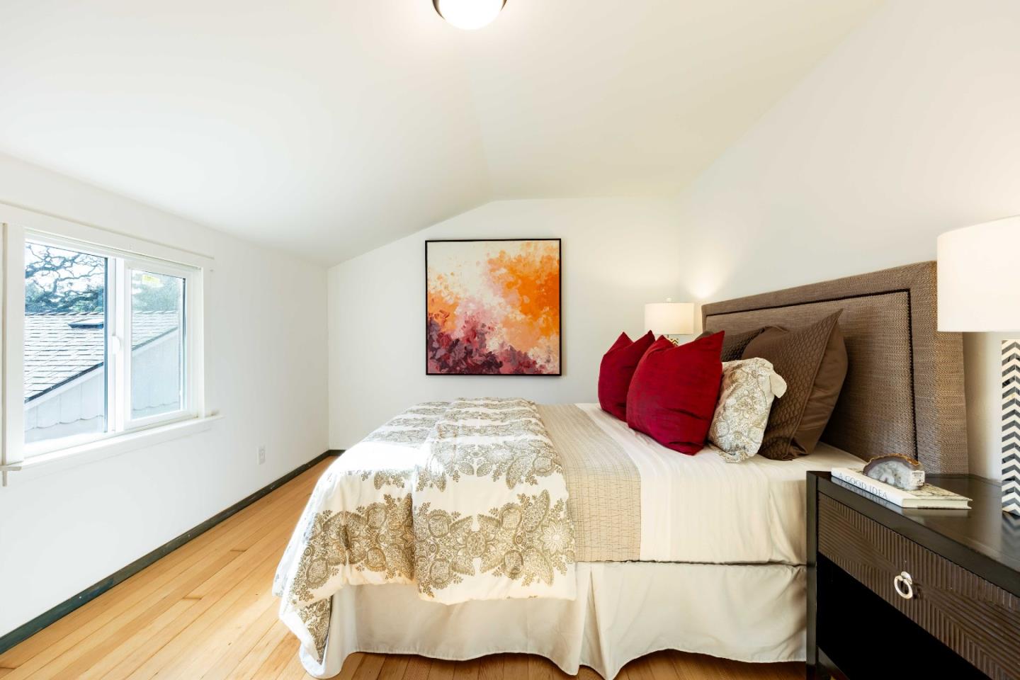 104 Clover Lane Menlo Park, CA 94025 - Photo 13 of 26 a bedroom with a bed and a flat screen tv