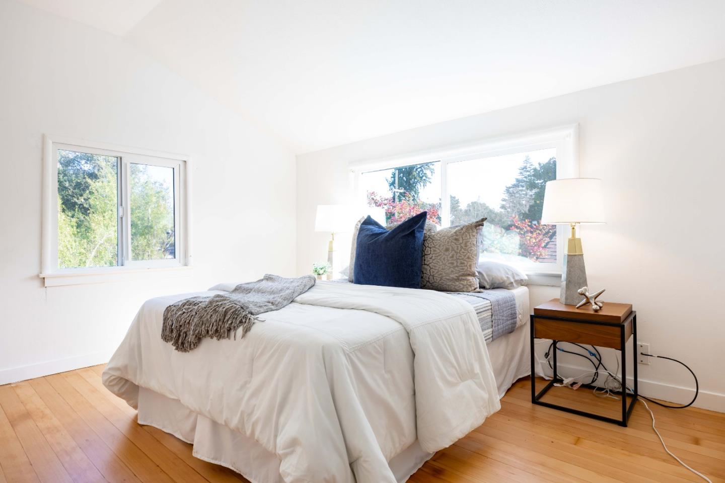 104 Clover Lane Menlo Park, CA 94025 - Photo 14 of 26 a bedroom with a bed and a window