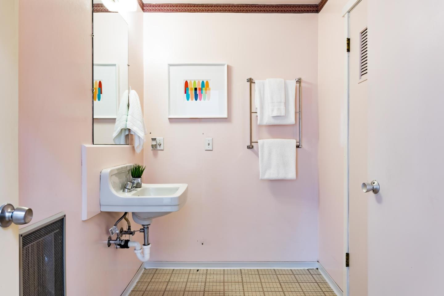 104 Clover Lane Menlo Park, CA 94025 - Photo 16 of 26 a bathroom with a sink toilet and mirror