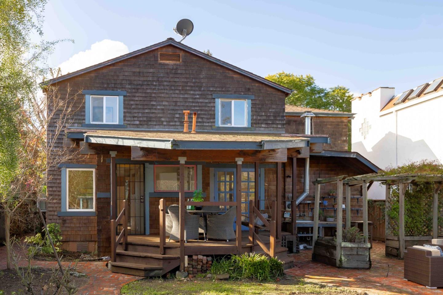 104 Clover Lane Menlo Park, CA 94025 - Photo 23 of 26 a view of a house with a porch and furniture