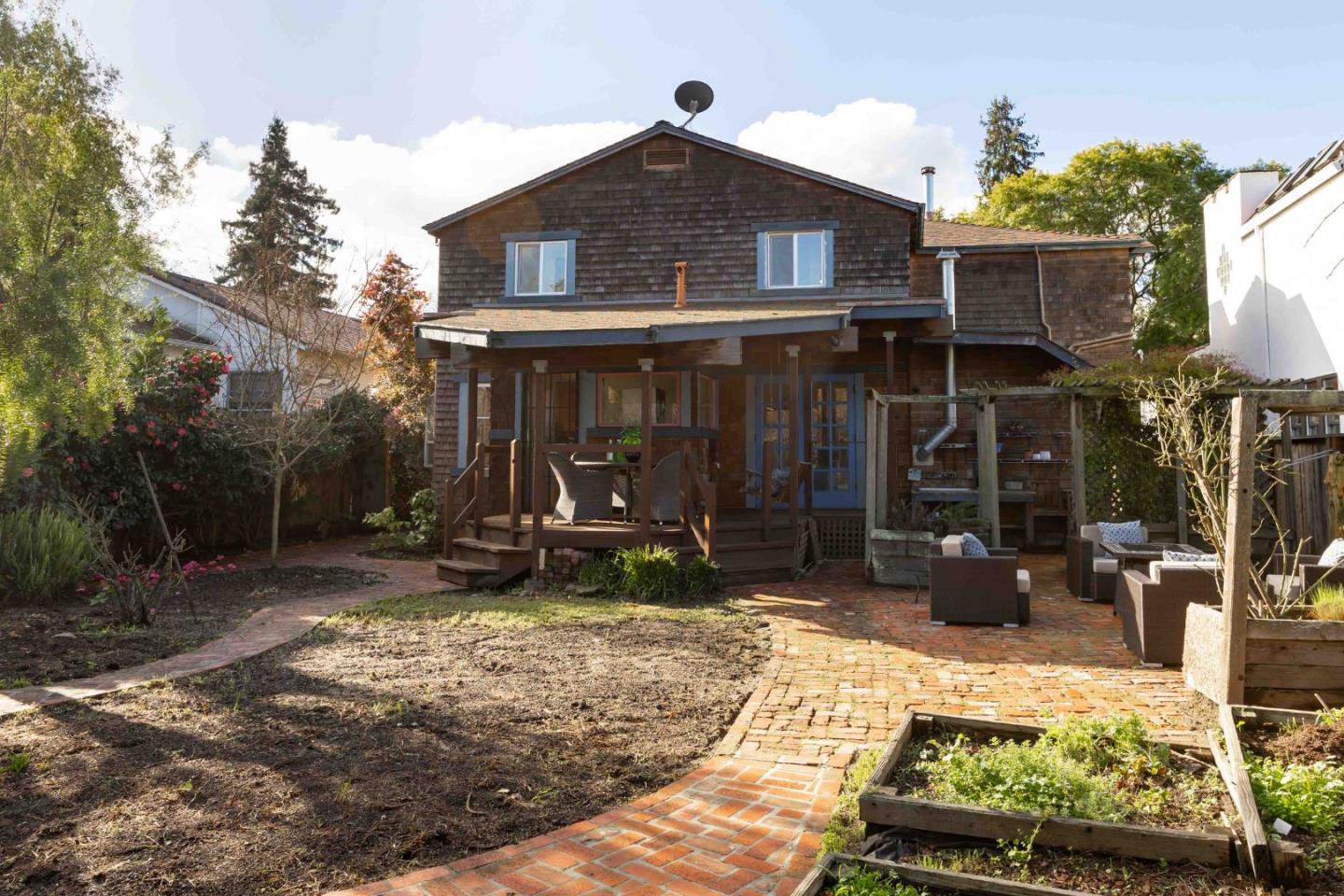 104 Clover Lane Menlo Park, CA 94025 - Photo 24 of 26 a view of a house with backyard stove and sitting area