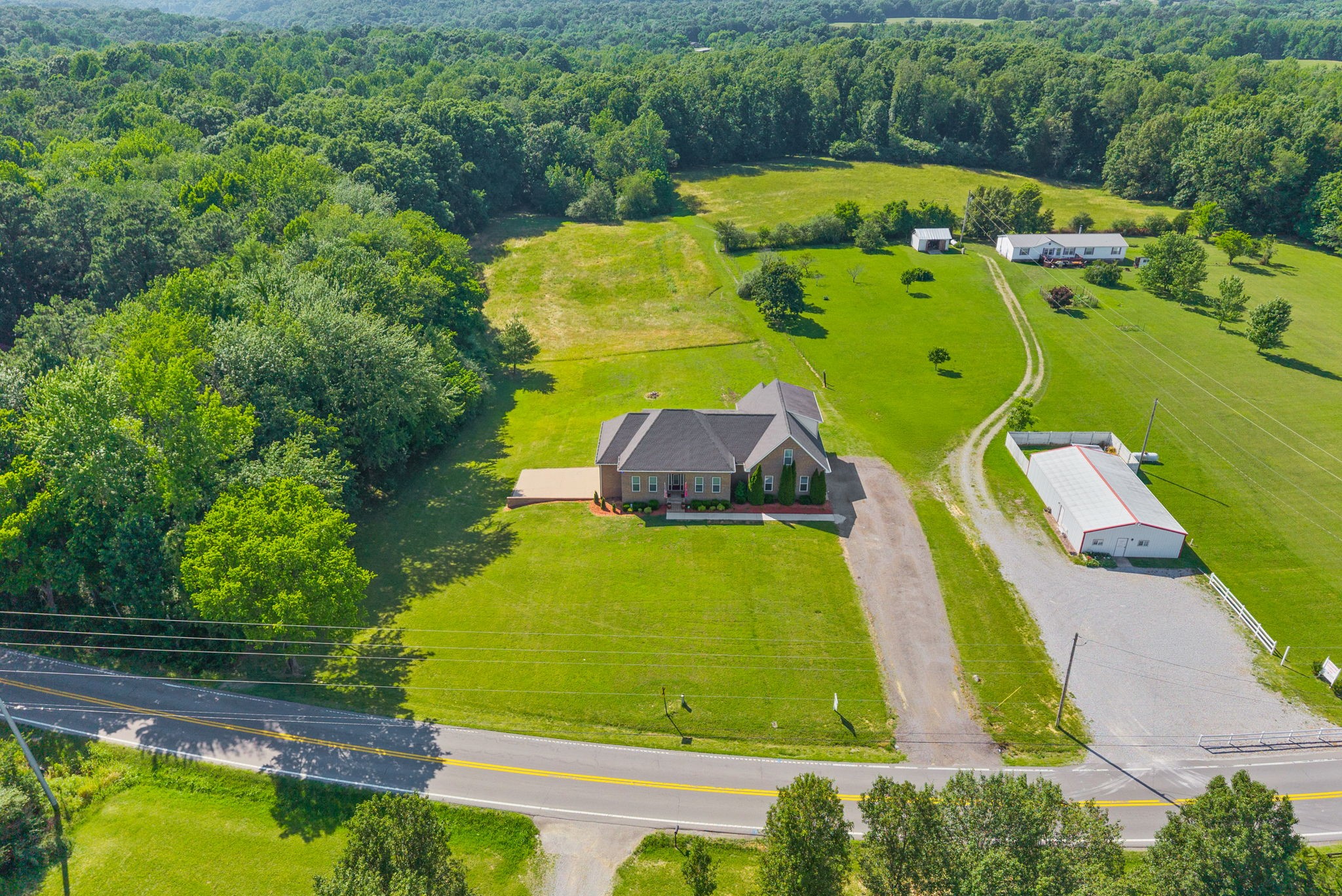 4940 Marion Road Cunningham, TN 37052 - Photo 40 of 43 an aerial view of a pool