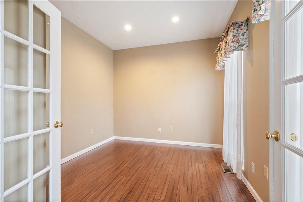 372 Indian Ridge Drive Coraopolis, PA 15108 - Photo 13 of 30 a view of a hallway with wooden floor and a window