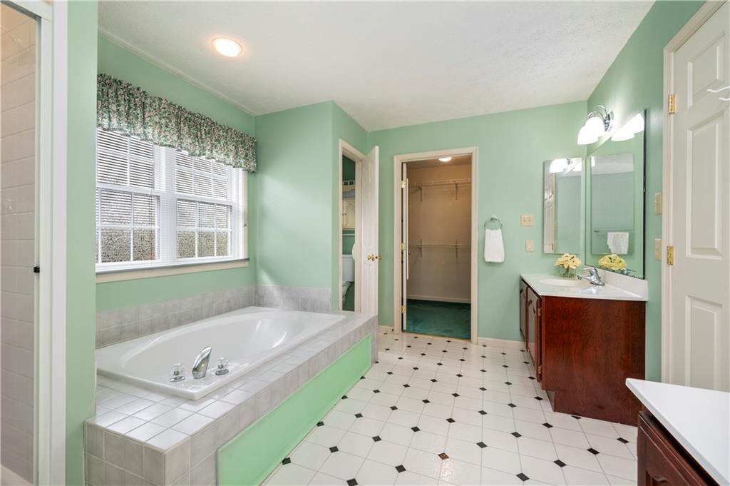 372 Indian Ridge Drive Coraopolis, PA 15108 - Photo 17 of 30 a bathroom with a sink a toilet and shower