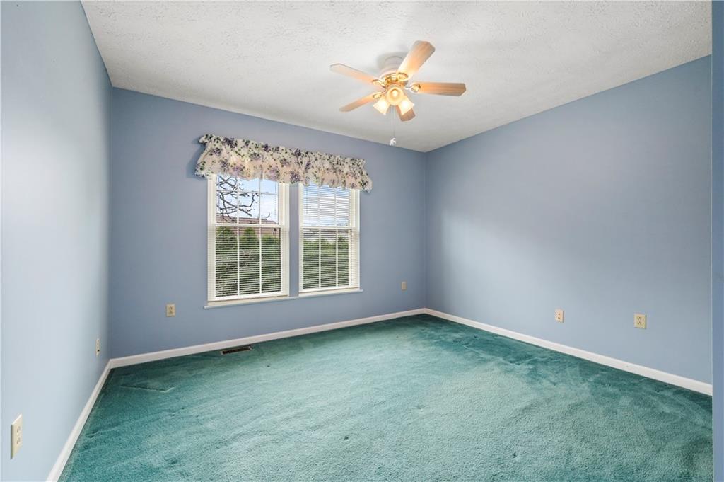 372 Indian Ridge Drive Coraopolis, PA 15108 - Photo 20 of 30 an empty room with a window