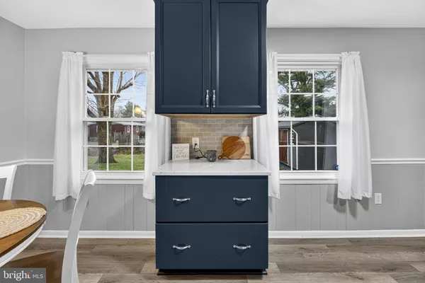 a view of front door and wooden floor