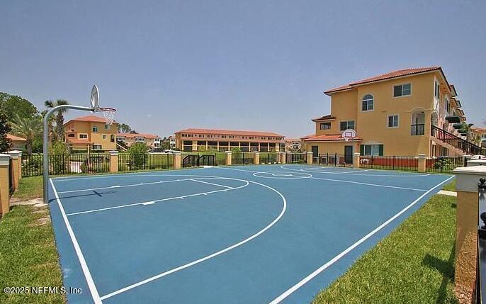 9745 Touchton Road, Unit 1103 Jacksonville, FL 32246 - Photo 26 of 29 a view of a tennis court