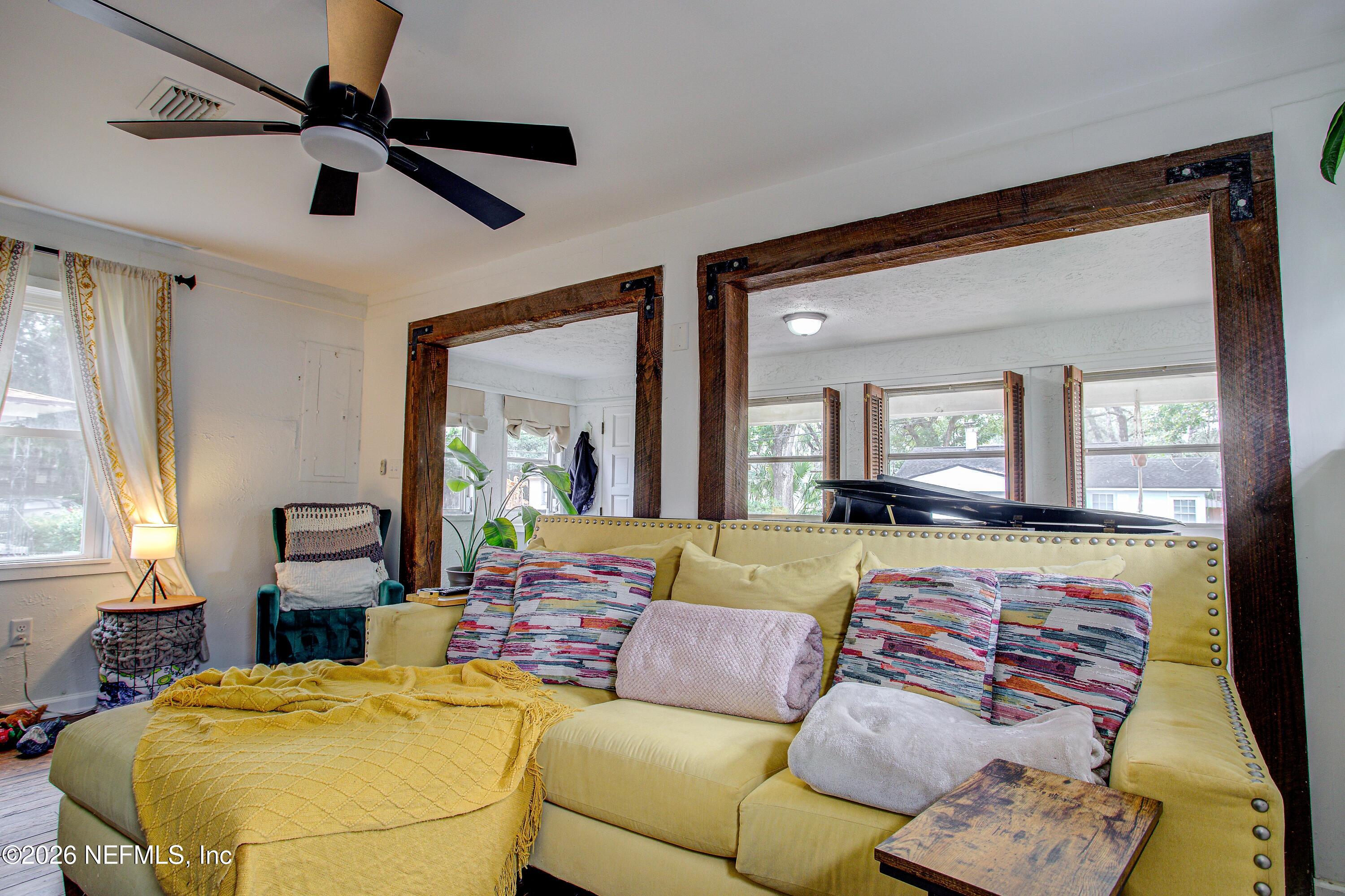 1441 Rensselaer Avenue Jacksonville, FL 32205 - Photo 14 of 33 a living room with furniture and a large window