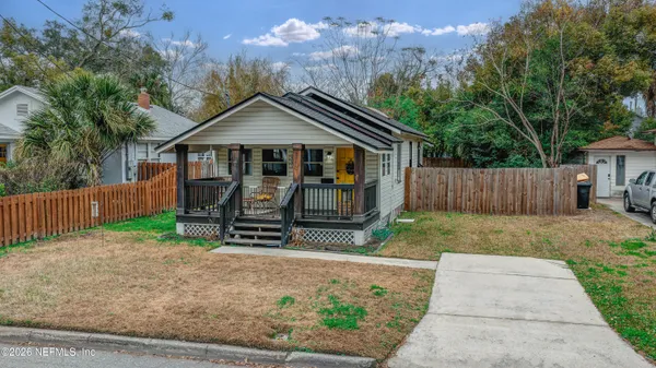 front view of a house with a yard