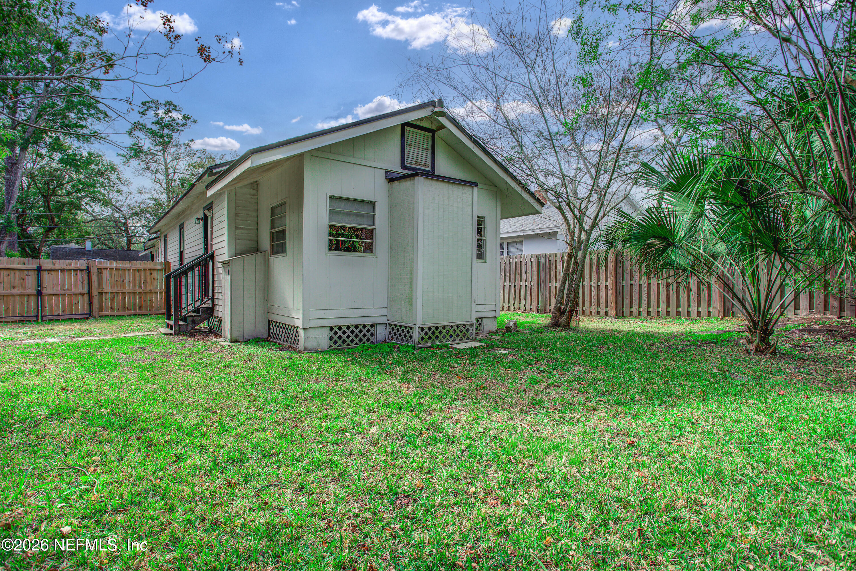 1441 Rensselaer Avenue Jacksonville, FL 32205 - Photo 30 of 33 a view of a house with yard