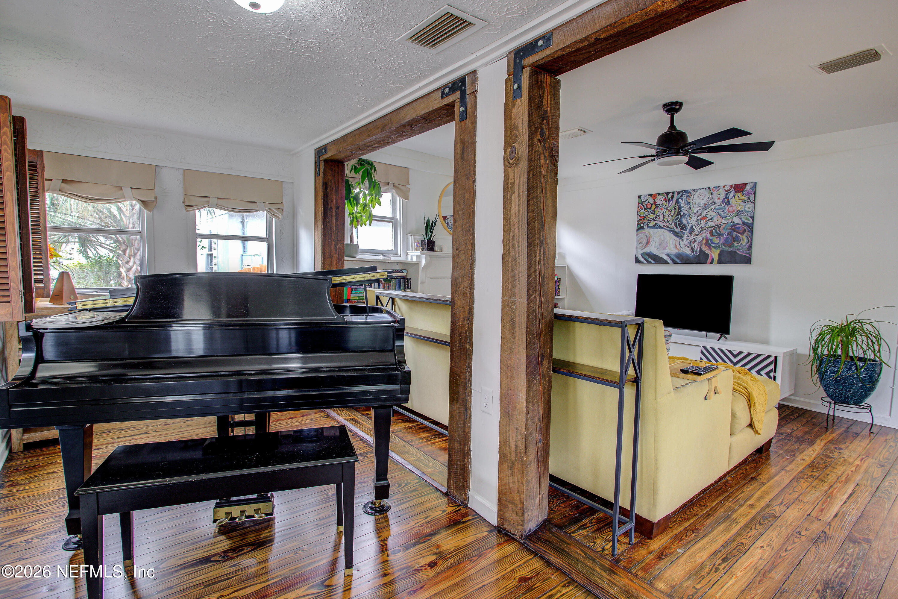 1441 Rensselaer Avenue Jacksonville, FL 32205 - Photo 10 of 33 a living room with furniture and a flat screen tv