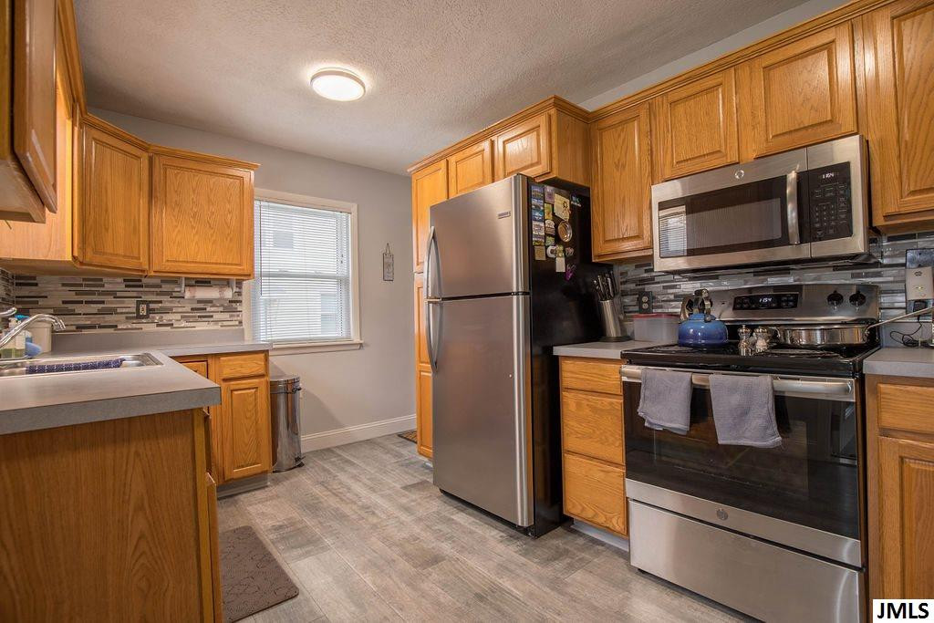 3420 Sylvan Road Lansing, MI 48917 - Photo 6 of 24 Photo 6